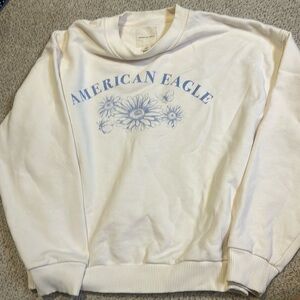AE women’s Crew Neck sweatshirt; Cream with periwinkle print ; Size: small